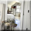 DM06. Tall mirror with white frame. 65”h x 32”w 